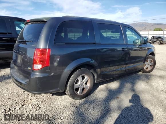2012 Dodge Grand Caravan SXT z VIN 2C4RDGCG6CR197022, wystawiony jako Copart lot #90370815 z przebiegiem 131 612 mil mil oraz Czysty tytuł • Clean title. Historia ofert i sprzedaży dostępna na DreamBid. Obrazek 3.