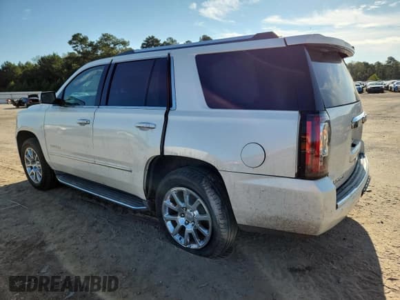 ✅ 2015 GMC Yukon Denali • VIN: 1GKS1CKJ2FR235473 • Lot: 71946005. Listed on Copart with 191,529 mi. Free auction sales archive from the USA and detailed vehicle history report at DreamBid. Image 2.