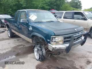 1993 Dodge Dakota z VIN 1B7GG23Y4PS212227, wystawiony jako IAAI lot #42748518 z przebiegiem 269 514 mil mil oraz . Historia ofert i sprzedaży dostępna na DreamBid. Obrazek 1.