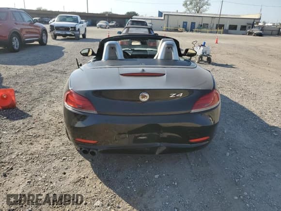 ✅ 2012 BMW Z4 sDrive28i • VIN: WBALL5C5XCE716711 • Lot: 75706534. Listed on Copart with 89,948 mi. Free auction sales archive from the USA and detailed vehicle history report at DreamBid. Image 6.
