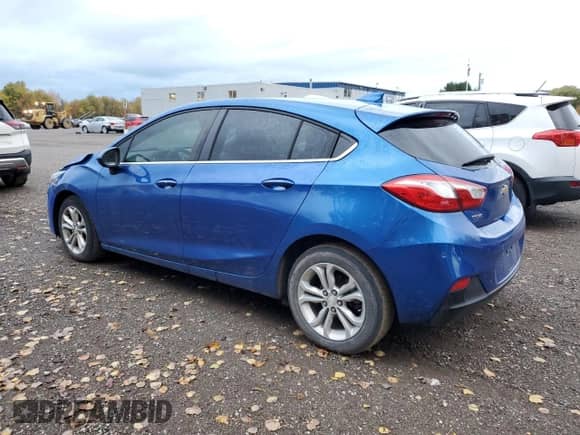 2019 Chevrolet Cruze LT with VIN 3G1BE6SM7KS566917, listed as a Copart auction lot 87097245 with 158,856 mi miles and Salvage title. Bid and sale history available at DreamBid. Image 2.