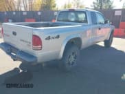 ✅ 2004 Dodge Dakota • VIN: 1D7HG12KX4S713541 • Lot: 43611680. Wystawiony na IAAI z przebiegiem 186 687 mil. Bezpłatny archiwum sprzedaży aukcyjnych z USA i szczegółowy raport historii pojazdu na DreamBid. Zdjęcie 4.