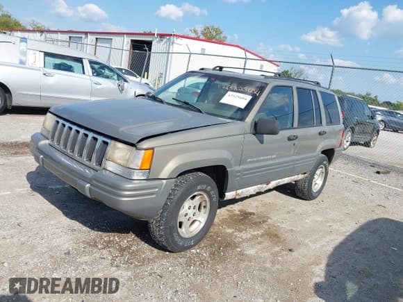 ✅ 1998 Jeep Grand Cherokee Laredo • VIN: 1J4GZ48S8WC349667 • Лот: 43325604. Опубликован ранее на IAAI с пробегом 232 752 миль. Бесплатный доступ к архиву аукционных продаж из США и подробный отчёт об истории автомобиля на DreamBid. Изображение 2.