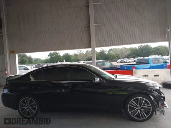 ✅ 2014 Infiniti Q50 Premium • VIN: JN1BV7AP9EM680983 • Lot: 43773117. Listed on IAAI with 202,089 mi. Free auction sales archive from the USA and detailed vehicle history report at DreamBid. Image 14.