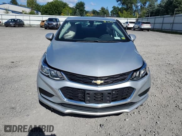 ✅ 2018 Chevrolet Cruze LS • VIN: 1G1BC5SM1J7205440 • Lot: 66359193. Listed on Copart with 15,435 mi. Free auction sales archive from the USA and detailed vehicle history report at DreamBid. Image 5.