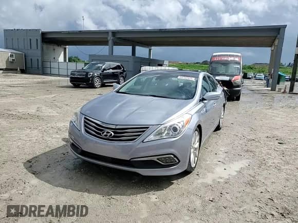 2016 Hyundai Azera Limited z VIN KMHFH4JG1GA569686, wystawiony jako Copart lot #84792425 z przebiegiem 92 869 mil mil oraz Szkoda całkowita • Salvage title. Historia ofert i sprzedaży dostępna na DreamBid. Obrazek 13.