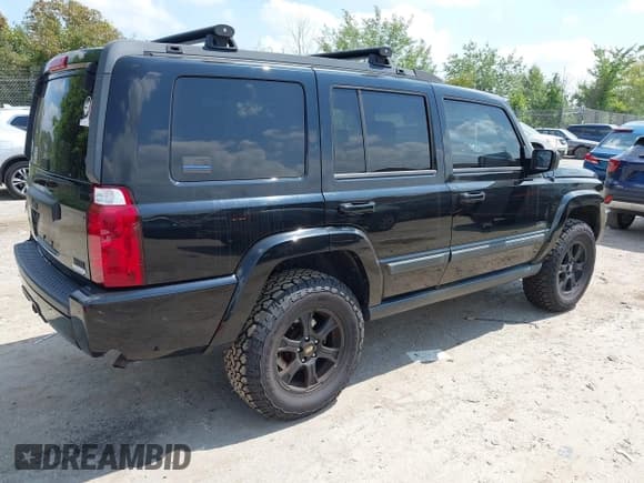 ✅ 2007 Jeep Commander Sport • VIN: 1J8HG48P77C632972 • Lot: 43004736. Listed on IAAI with 201,495 mi. Free auction sales archive from the USA and detailed vehicle history report at DreamBid. Image 4.