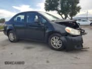 ✅ 2012 Suzuki SX4 LE • VIN: JS2YC5A38C6301090 • Lot: 68842295. Wystawiony na Copart z przebiegiem 103 741 mil. Bezpłatny archiwum sprzedaży aukcyjnych z USA i szczegółowy raport historii pojazdu na DreamBid. Zdjęcie 4.
