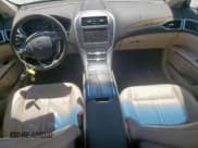 ✅ 2016 Lincoln MKZ Hybrid • VIN: 3LN6L2LU2GR625176 • Lot: 54044385. Listed on Copart with 124,861 mi. Free auction sales archive from the USA and detailed vehicle history report at DreamBid. Image 8.