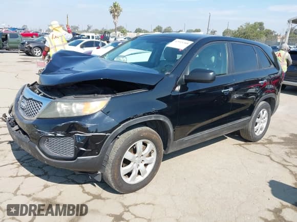 ✅ 2011 Kia Sorento LX • VIN: 5XYKT3A15BG005779 • Lot: 42915388. Listed on IAAI with 180,119 mi. Free auction sales archive from the USA and detailed vehicle history report at DreamBid. Image 18.