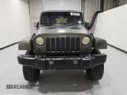 ✅ 2007 Jeep Wrangler Unlimited Sahara • VIN: 1J4GB59157L143188 • Лот: 67048525. Опубликован ранее на Copart с пробегом 219 248 миль. Бесплатный доступ к архиву аукционных продаж из США и подробный отчёт об истории автомобиля на DreamBid. Изображение 5.