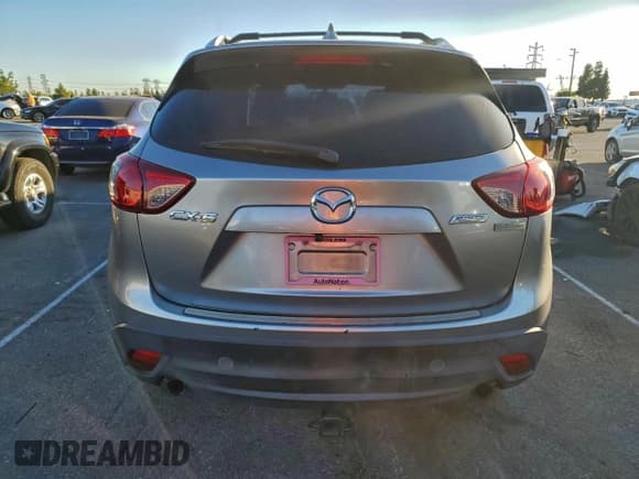 ✅ 2014 Mazda CX-5 Sport • VIN: JM3KE2BE5E0379221 • Lot: 96541255. Listed on Copart with 216,899 mi. Free auction sales archive from the USA and detailed vehicle history report at DreamBid. Image 6.