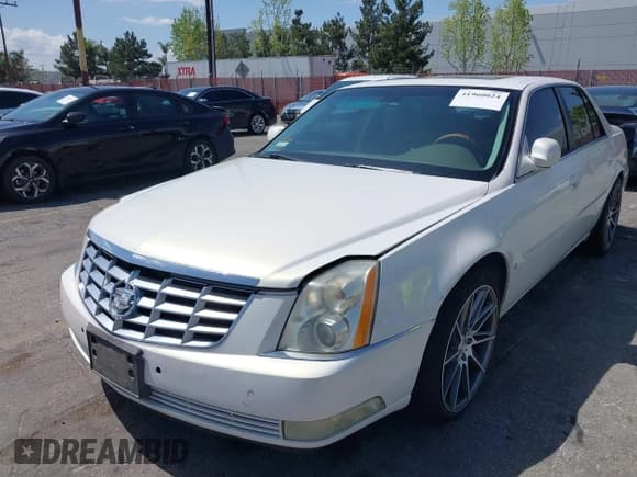 ✅ 2006 Cadillac DTS 1SC • VIN: 1G6KD57Y96U112581 • Лот: 41960024. Опубликован ранее на IAAI с пробегом 105 033 миль. Бесплатный доступ к архиву аукционных продаж из США и подробный отчёт об истории автомобиля на DreamBid. Изображение 6.