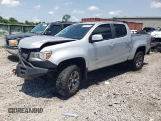 ✅ 2018 Chevrolet Colorado 4WD Z71 • VIN: 1GCGTDEN8J1149303 • Лот: 57241124. Опубликован ранее на Copart с пробегом 113 724 миль. Бесплатный доступ к архиву аукционных продаж из США и подробный отчёт об истории автомобиля на DreamBid. Изображение 1.