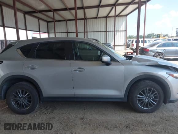 ✅ 2020 Mazda CX-5 Touring • VIN: JM3KFACM8L1770738 • Lot: 43237475. Wystawiony na IAAI z przebiegiem 96 169 mil. Bezpłatny archiwum sprzedaży aukcyjnych z USA i szczegółowy raport historii pojazdu na DreamBid. Zdjęcie 13.