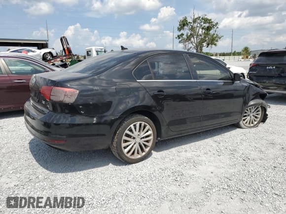 ✅ 2015 Volkswagen Jetta SE • VIN: 3VWD17AJ1FM238876 • Lot: 58957215. Listed on Copart with 122,705 mi. Free auction sales archive from the USA and detailed vehicle history report at DreamBid. Image 3.