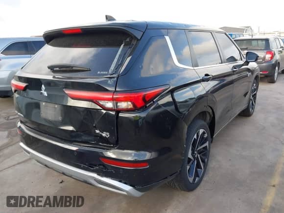 2023 Mitsubishi Outlander SE with VIN JA4T5UA97PZ058755, listed as a IAAI auction lot 42543170 with 66,418 mi miles and . Bid and sale history available at DreamBid. Image 4.