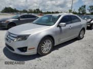 ✅ 2010 Ford Fusion Hybrid • VIN: 3FADP0L39AR182968 • Lot: 66120535. Wystawiony na Copart z przebiegiem 105 952 mil. Bezpłatny archiwum sprzedaży aukcyjnych z USA i szczegółowy raport historii pojazdu na DreamBid. Zdjęcie 1.