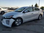 ✅ 2017 Hyundai Ioniq Blue • VIN: KMHC65LC1HU022409 • Lot: 82265615. Listed on Copart with 83,392 mi. Free auction sales archive from the USA and detailed vehicle history report at DreamBid. Image 1.