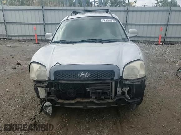✅ 2004 Hyundai Santa Fe GLS • VIN: KM8SC13D74U659059 • Lot: 57156945. Listed on Copart with 141,881 mi. Free auction sales archive from the USA and detailed vehicle history report at DreamBid. Image 15.
