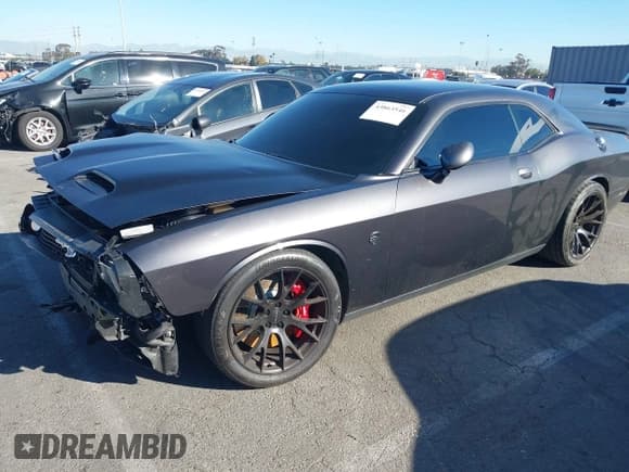 ✅ 2016 Dodge Challenger SRT Hellcat • VIN: 2C3CDZC93GH270902 • Lot: 43863546. Listed on IAAI with 33,410 mi. Free auction sales archive from the USA and detailed vehicle history report at DreamBid. Image 2.