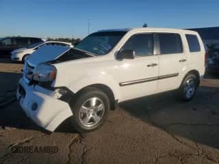 2011 Honda Pilot LX with VIN 5FNYF4H24BB023106, listed as a Copart auction lot 86053345 with 121,323 mi miles and Salvage title. Bid and sale history available at DreamBid. Image 1.