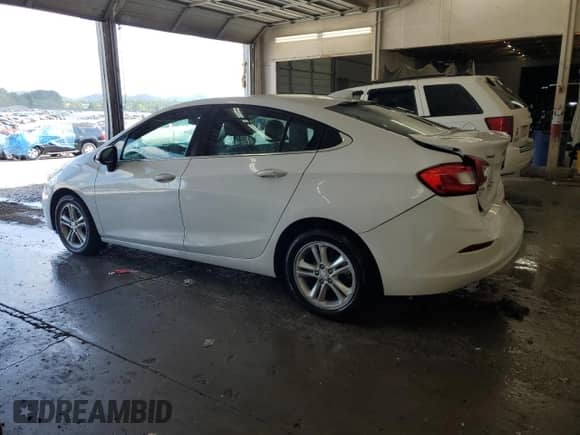 ✅ 2018 Chevrolet Cruze LT • VIN: 1G1BE5SM2J7234472 • Лот: 63101265. Опубликован ранее на Copart с пробегом 124 172 миль. Бесплатный доступ к архиву аукционных продаж из США и подробный отчёт об истории автомобиля на DreamBid. Изображение 2.