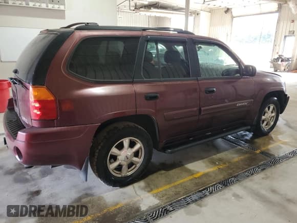 ✅ 2004 GMC Envoy SLE • VIN: 1GKDT13SX42373881 • Lot: 68672365. Listed on Copart with 200,806 mi. Free auction sales archive from the USA and detailed vehicle history report at DreamBid. Image 3.