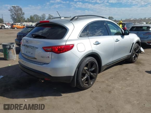 ✅ 2016 Infiniti QX70 • VIN: JN8CS1MU5GM670970 • Lot: 43421444. Listed on IAAI with 34,520 mi. Free auction sales archive from the USA and detailed vehicle history report at DreamBid. Image 4.