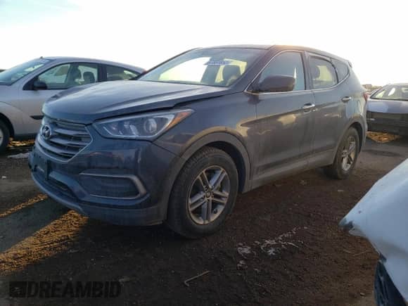 ✅ 2018 Hyundai Santa Fe 2.4L • VIN: 5XYZTDLB8JG523085 • Лот: 67651652. Опубликован ранее на Copart с пробегом 91 830 миль. Бесплатный доступ к архиву аукционных продаж из США и подробный отчёт об истории автомобиля на DreamBid. Изображение 1.