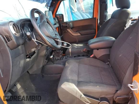 2012 Jeep Wrangler Sport z VIN 1C4AJWAGXCL187041, wystawiony jako Copart lot #71404335 z przebiegiem 127 412 mil mil oraz Szkoda całkowita • Salvage title. Historia ofert i sprzedaży dostępna na DreamBid. Obrazek 7.