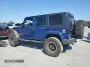 ✅ 2009 Jeep Wrangler Unlimited Sahara • VIN: 1J4GA59169L770214 • Lot: 81599695. Listed on Copart with 114,451 mi. Free auction sales archive from the USA and detailed vehicle history report at DreamBid. Image 2.