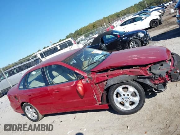 ✅ 2003 Saturn LS • VIN: 1G8JU54F33Y528166 • Lot: 43455274. Listed on IAAI with Not provided. Free auction sales archive from the USA and detailed vehicle history report at DreamBid. Image 13.