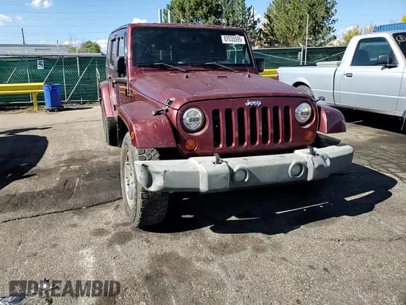 ✅ 2007 Jeep Wrangler Unlimited Sahara • VIN: 1J4GA59127L220196 • Лот: 87035595. Опубликован ранее на Copart с пробегом 224 391 миль. Бесплатный доступ к архиву аукционных продаж из США и подробный отчёт об истории автомобиля на DreamBid. Изображение 14.