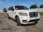 ✅ 2018 Lincoln Navigator Reserve • VIN: 5LMJJ3LT0JEL20506 • Lot: 71877135. Listed on Copart with 96,275 mi. Free auction sales archive from the USA and detailed vehicle history report at DreamBid. Image 14.