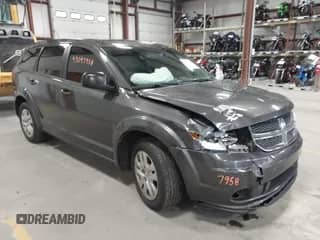 2015 Dodge Journey American Value z VIN 3C4PDCAB1FT756212, wystawiony jako IAAI lot #43097958 z przebiegiem 150 921 mil mil oraz . Historia ofert i sprzedaży dostępna na DreamBid. Obrazek 1.
