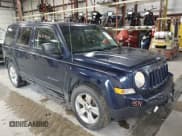 ✅ 2014 Jeep Patriot Latitude • VIN: 1C4NJRFB0ED730765 • Lot: 42309571. Listed on IAAI with 218,577 mi. Free auction sales archive from the USA and detailed vehicle history report at DreamBid. Image 1.