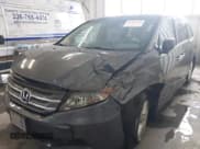 ✅ 2012 Honda Odyssey Touring • VIN: 5FNRL5H92CB106325 • Lot: 43287538. Listed on IAAI with 206,962 mi. Free auction sales archive from the USA and detailed vehicle history report at DreamBid. Image 6.