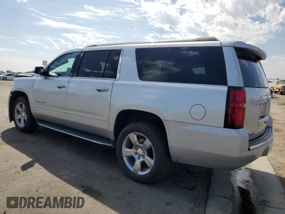 2020 Chevrolet Suburban Premier с VIN 1GNSCJKC0LR216855, выставлен на аукционе Copart как лот 72287114 с пробегом 94 642 миль миль и Списание • Salvage title. История ставок и продаж доступна на DreamBid. Изображение 2.