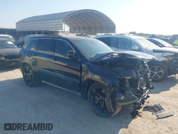 ✅ 2016 Jeep Grand Cherokee Overland • VIN: 1C4RJFCT6GC471673 • Lot: 40584190. Listed on IAAI with 128,482 mi. Free auction sales archive from the USA and detailed vehicle history report at DreamBid. Image 1.