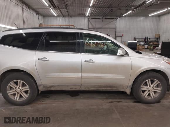 ✅ 2016 Chevrolet Traverse LT • VIN: 1GNKVGKDXGJ165682 • Lot: 42176875. Listed on IAAI with 240,342 mi. Free auction sales archive from the USA and detailed vehicle history report at DreamBid. Image 14.