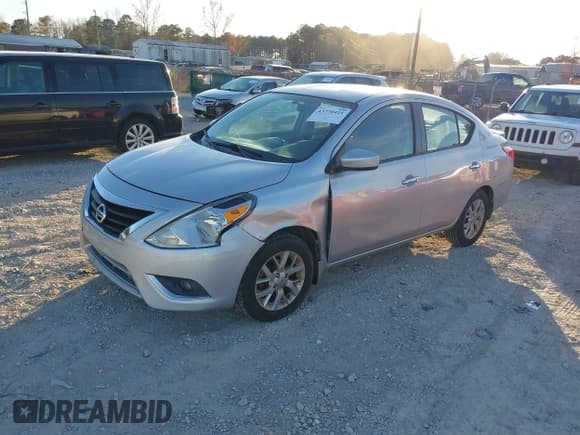 ✅ 2018 Nissan Versa SV • VIN: 3N1CN7AP6JL869549 • Lot: 43770421. Listed on IAAI with 161,318 mi. Free auction sales archive from the USA and detailed vehicle history report at DreamBid. Image 2.