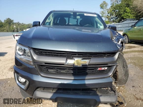 ✅ 2020 Chevrolet Colorado 2WD Z71 • VIN: 1GCGSDEN4L1135341 • Лот: 68313164. Опубликован ранее на Copart с пробегом 57 079 миль. Бесплатный доступ к архиву аукционных продаж из США и подробный отчёт об истории автомобиля на DreamBid. Изображение 5.