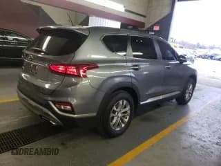✅ 2019 Hyundai Santa Fe SE • VIN: 5NMS2CAD6KH120975 • Lot: 68759392. Wystawiony na Copart z przebiegiem 51 647 mil. Bezpłatny archiwum sprzedaży aukcyjnych z USA i szczegółowy raport historii pojazdu na DreamBid. Zdjęcie 3.