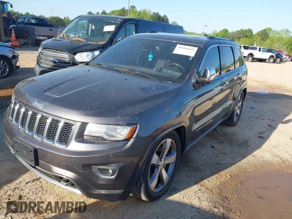 ✅ 2014 Jeep Grand Cherokee Overland • VIN: 1C4RJFCT3EC266101 • Lot: 39184826. Listed on IAAI with 141,512 mi. Free auction sales archive from the USA and detailed vehicle history report at DreamBid. Image 2.