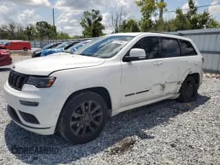 ✅ 2018 Jeep Grand Cherokee High Altitude • VIN: 1C4RJECG1JC125437 • Lot: 61579045. Listed on Copart with 90,993 mi. Free auction sales archive from the USA and detailed vehicle history report at DreamBid. Image 1.