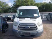 ✅ 2015 Ford Transit Cargo • VIN: 1FTSW2CG0FKB12869 • Lot: 42534494. Listed on IAAI with 173,919 mi. Free auction sales archive from the USA and detailed vehicle history report at DreamBid. Image 13.
