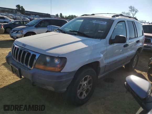 ✅ 1999 Jeep Grand Cherokee Laredo • VIN: 1J4GW58N8XC736438 • Лот: 88605625. Опубликован ранее на Copart с пробегом 181 612 миль. Бесплатный доступ к архиву аукционных продаж из США и подробный отчёт об истории автомобиля на DreamBid. Изображение 1.