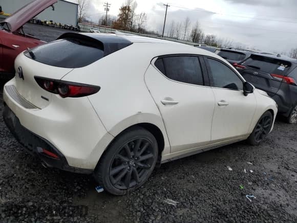 ✅ 2021 Mazda 3 Premium • VIN: JM1BPBML8M1302348 • Лот: 86628754. Опубликован ранее на Copart с пробегом 70 331 миль. Бесплатный доступ к архиву аукционных продаж из США и подробный отчёт об истории автомобиля на DreamBid. Изображение 3.
