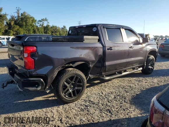 ✅ 2024 Chevrolet Silverado 1500 LT Trail Boss • VIN: 3GCUDFE81RG301652 • Lot: 82309385. Wystawiony na Copart z przebiegiem 30 010 mil. Bezpłatny archiwum sprzedaży aukcyjnych z USA i szczegółowy raport historii pojazdu na DreamBid. Zdjęcie 3.